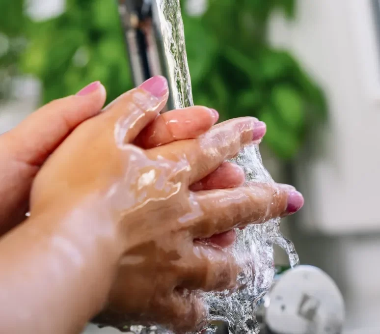 Woman washing her hands
